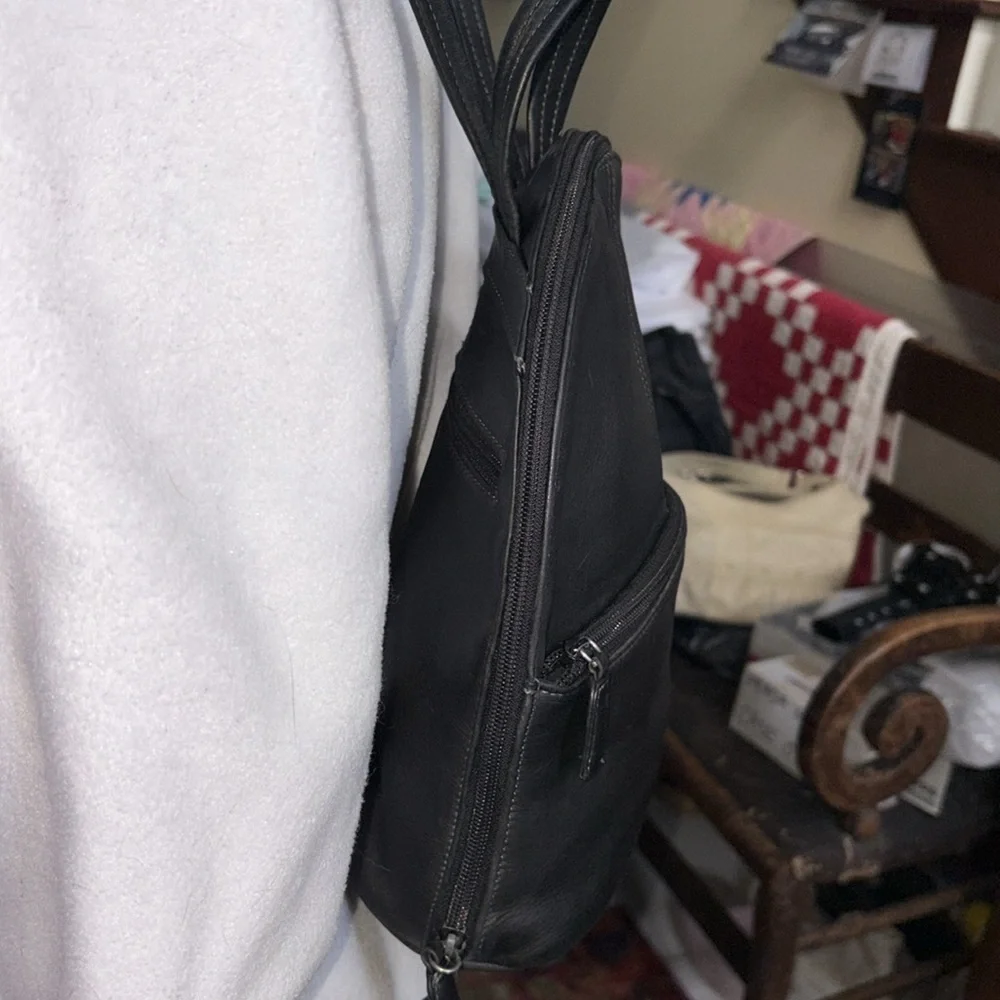 Tignanello backpack  mini backpack leather  black  2 exterior zipper pockets EUC